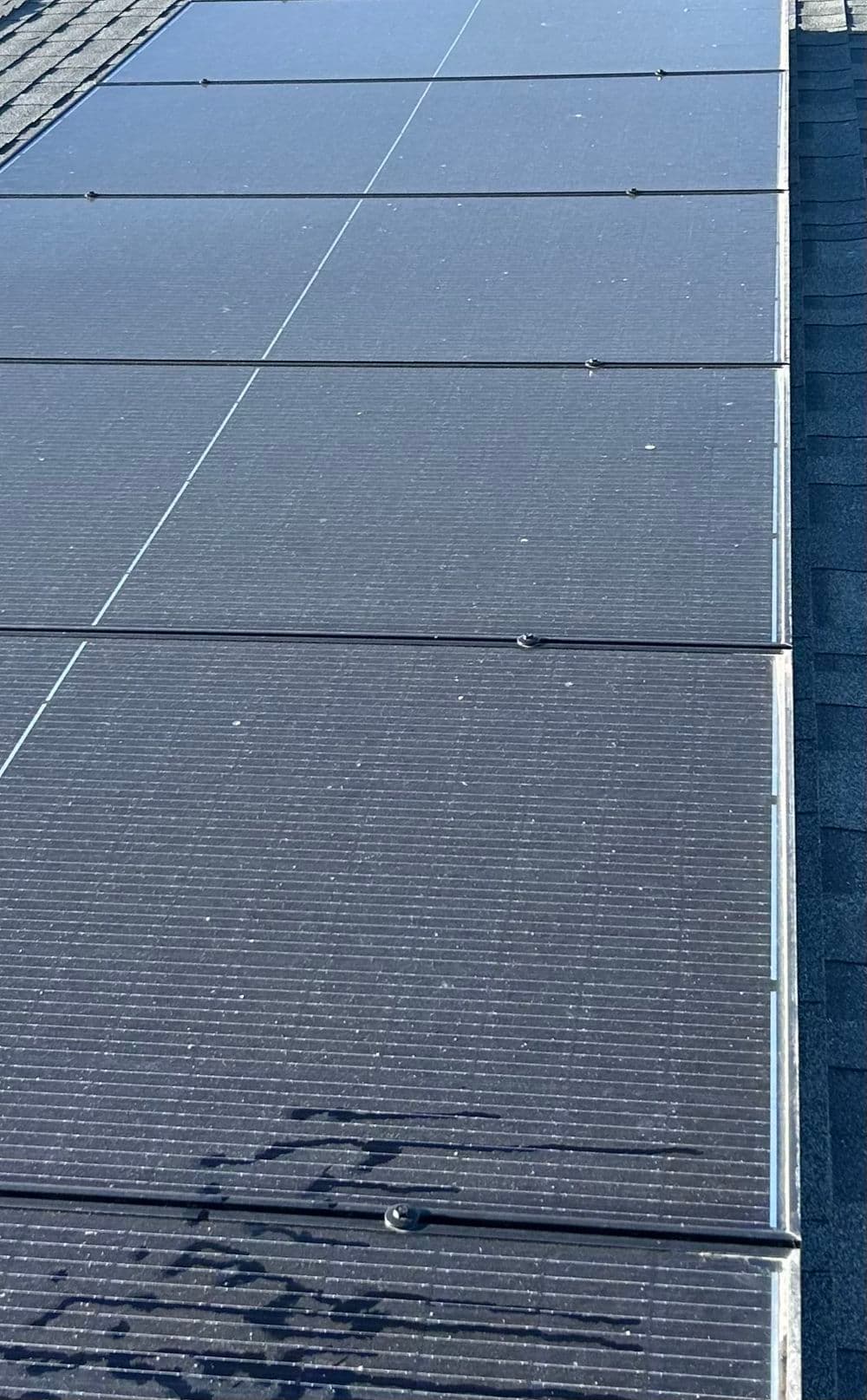 Solar panels installed on a rooftop, showcasing a clean energy solution.